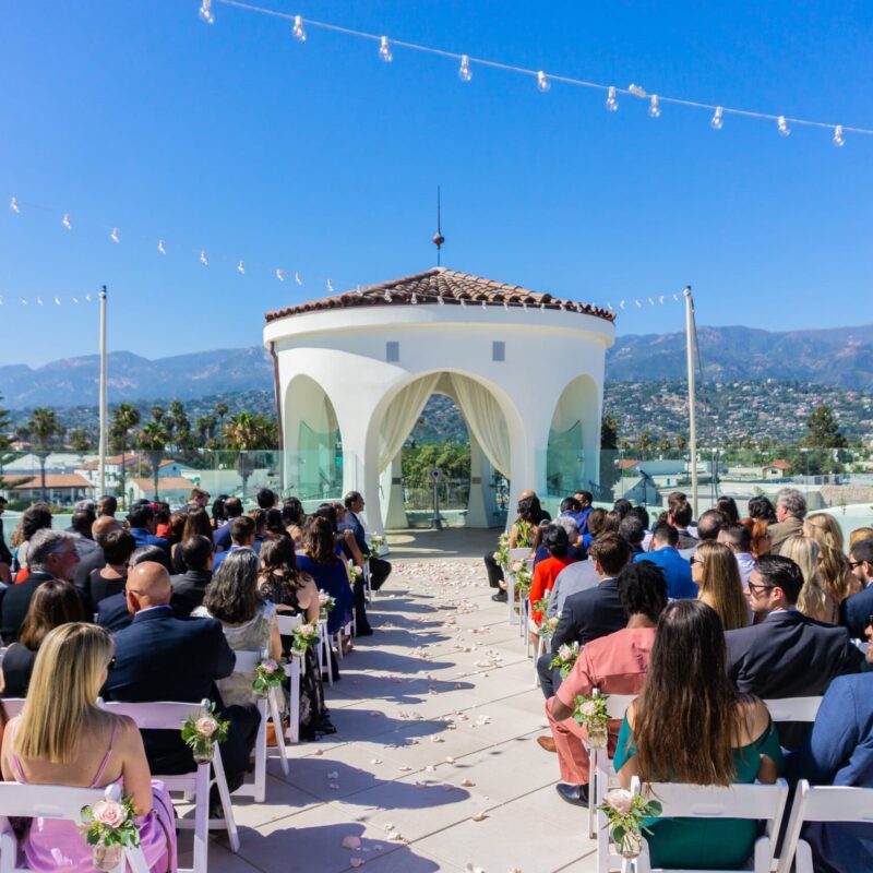 Sky Garden - ceremony seating (back) with guests- Nazareth Jones Wedding -Discount Party Rentals -MyWorld Productions